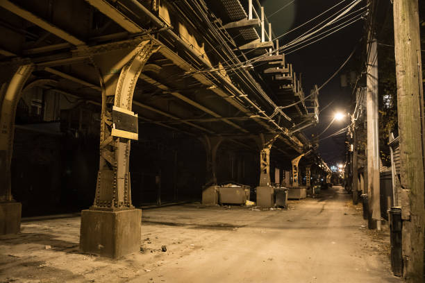 istock Dark city alley at night. 917532770