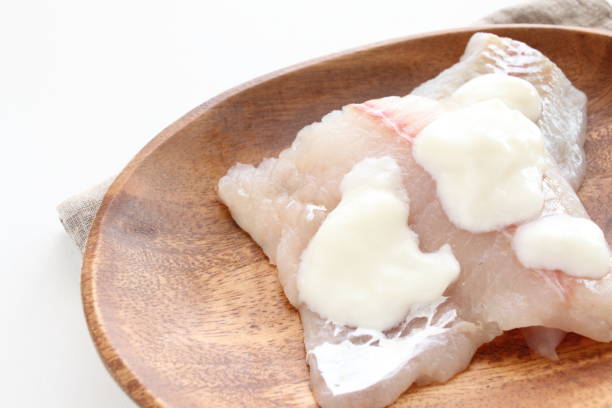 istock White fish fillet and yogurt 917535116