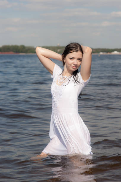 istock sensual girl in white dress 917535162