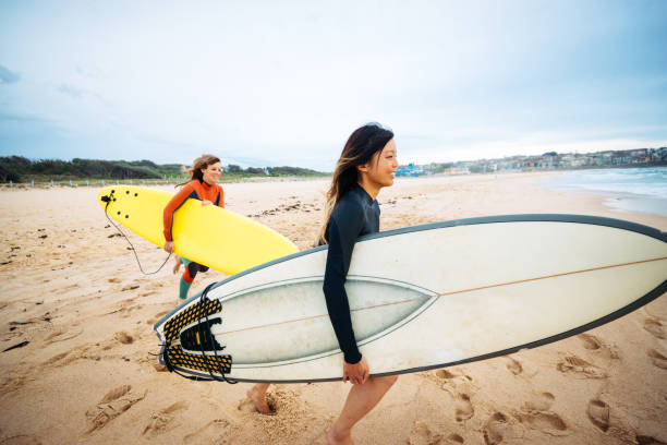 istock Running into the water for surfing 917535250