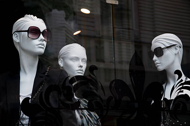 Mannequins in the shop window  haute couture stock pictures, royalty-free photos & images