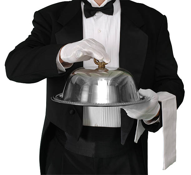 夕食をお出しいたします。 - butler domestic staff waiter tuxedo ストックフォトと画像