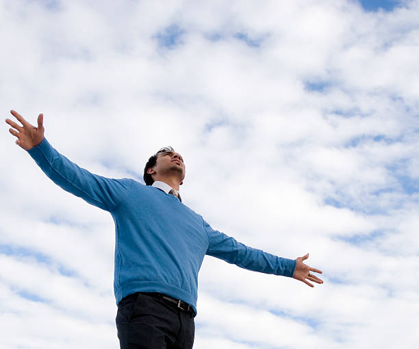 istock Young Man Enjoying life Arms Outstretched 91754948