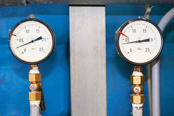 istock Two pressure gauges showing pressure close-up. 917553390