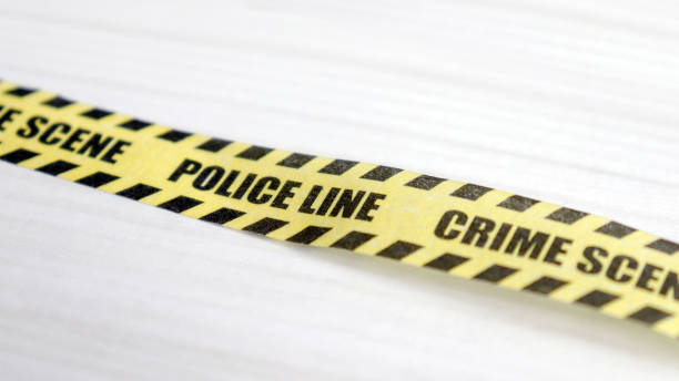 istock police line tape on the table 917553856