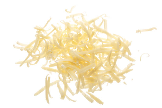 istock grated cheese isolated on white background. Top view 917554026