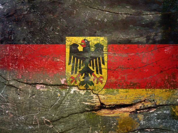 istock Flag of Germany, painted on a grunge Plank 917554232