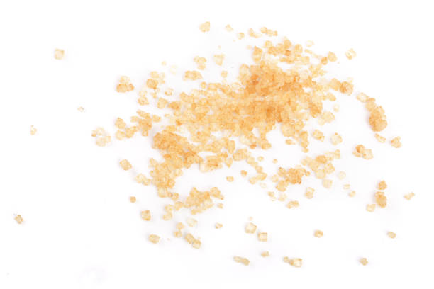 istock brown sugar isolated on white background. Top view. Flat lay 917554314
