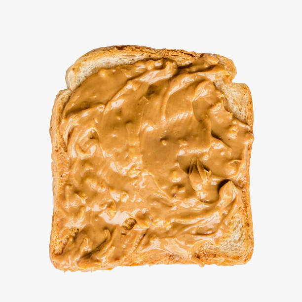 istock Sandwich with peanut pasta on white background 917569650