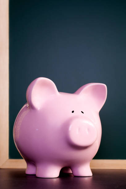 istock Piggy Bank and Blackboard 917574418