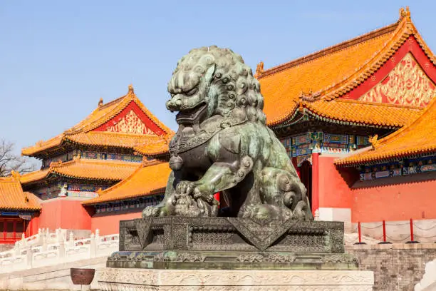 A bronze Lioness guarding the eastern approach to the Gtae of Supreme Harmony in the Forbidden City in Beijing, China