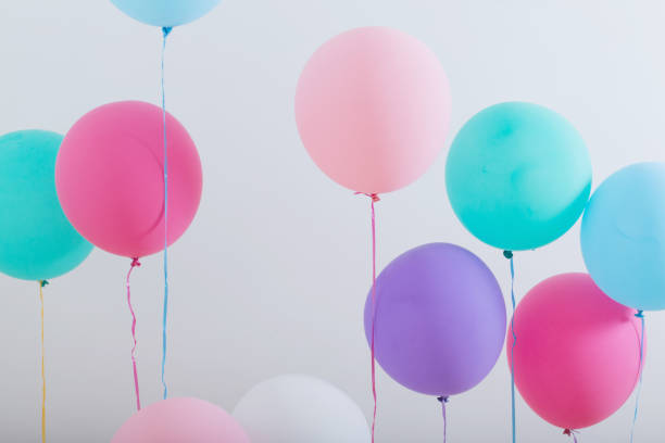 balloons on white wooden background