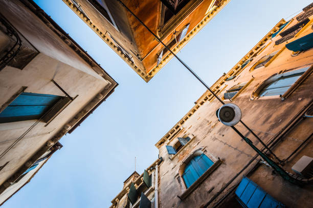 istock Low angle view on buildings in Venice, Italy 917582632