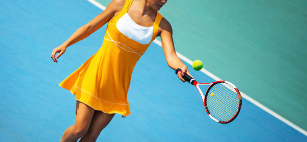 istock Woman playing tennis 917582784