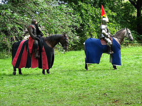 Knights on horseback at a turnament