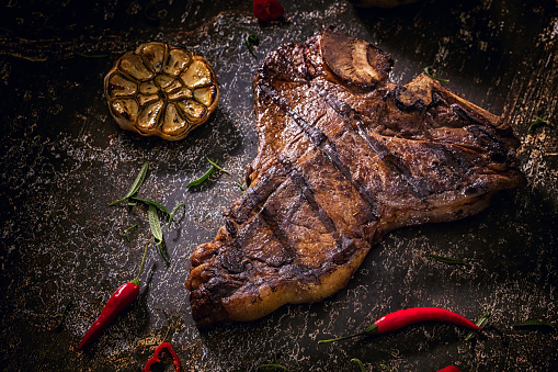 T-Bone Steak freshly roasted on Barbecue Grill