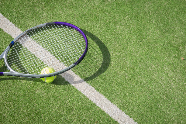 Paddle tennis court and ball stock photo