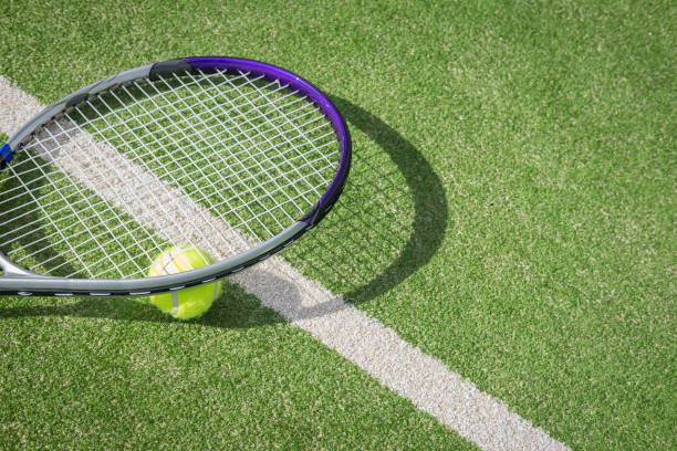 Paddle tennis court and ball stock photo