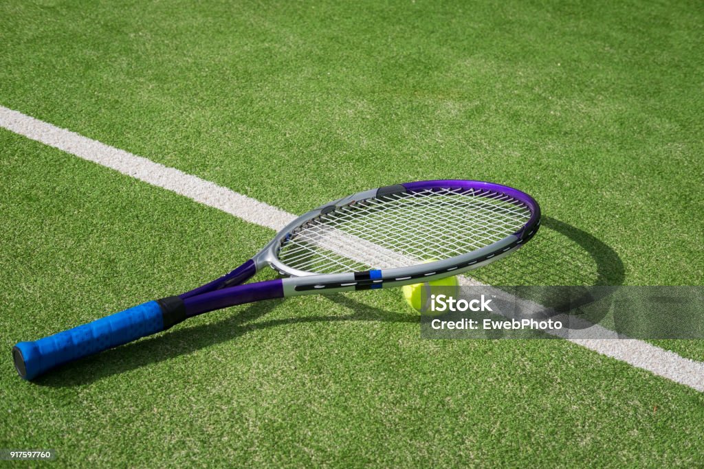 Paddle tennis court and ball Grass Stock Photo