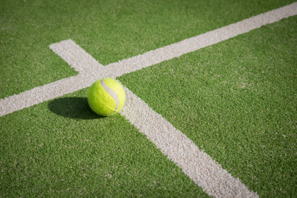 Paddle tennis court and ball stock photo