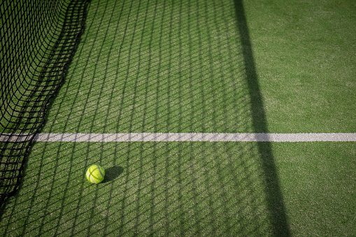 Tennis equipment on court