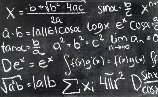 istock Handwritten mathematical formulas on blackboard written with chalk. 917599128