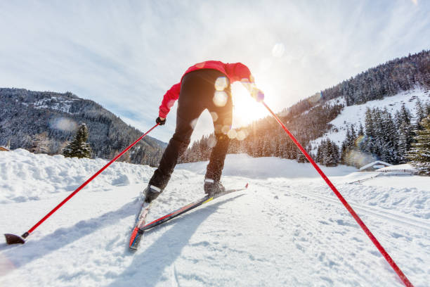 istock Cross-country skiing. Young man doing outdoor exercise. 917601798