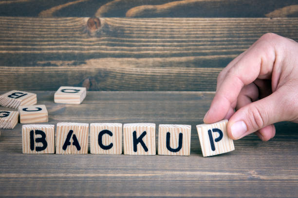 istock backup. Wooden letters on the office desk, informative and communication background 917603168