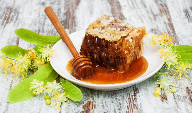 istock Honeycomb and linden flowers 917606606