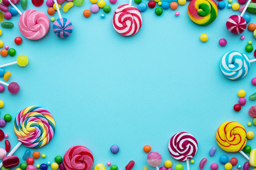 Colorful candies on a blue background