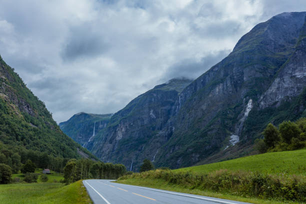 istock Norway landscape. Road, Waterfalls, mountains 917610052