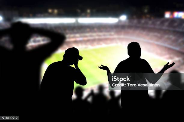 Sad Football Fans Disappointed Angry And Upset Crowd In A Match In A Soccer Stadium Favourite Team And Club Lost Game Devastated Audience In Live Sport Event Stock Photo - Download Image Now