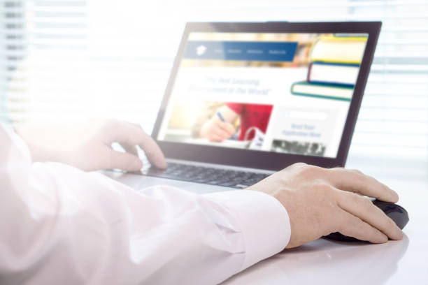 istock Web designer testing or designing new website. New website layout on laptop screen. Professional man working in creative marketing and communications agency office. 917611014