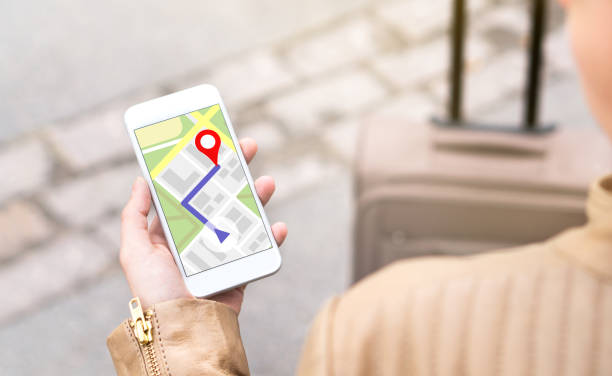 istock Woman navigating with mobile phone map application. Tourist with walking route on smartphone screen. 917611358