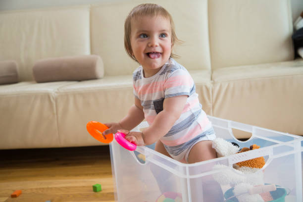 istock Baby boy playing with toy 917614408