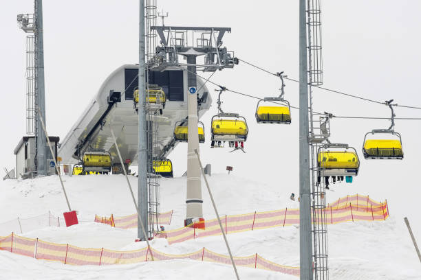 istock Chair lift in ski resort 917614422