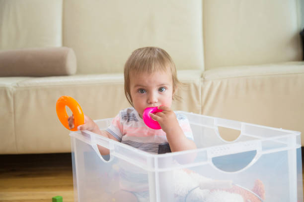 istock Baby boy playing with toy 917614428