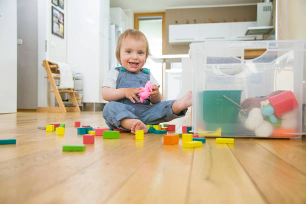 istock Baby boy playing with toy 917614430