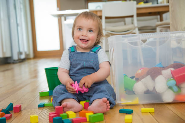 istock Baby boy playing with toy 917614462