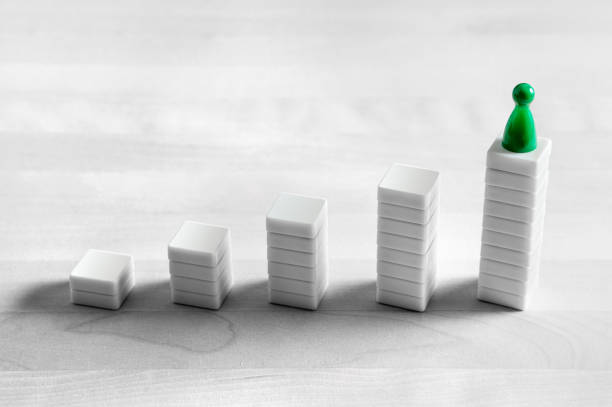istock Winning, success, progress and development concept. Leadership and management. Climb to the highest top. Reaching goals. 917616014