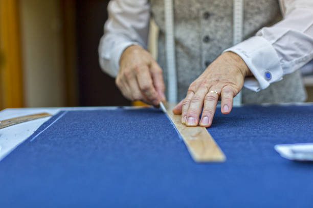 istock Tailor Man Working in His Tailor Shop 917616606