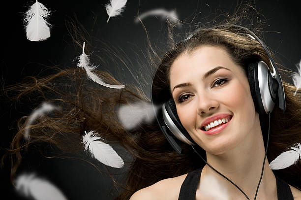 istock girl in headphones 91761913