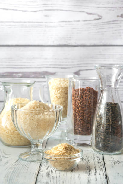 istock Different kinds of rice on the white background 917619444