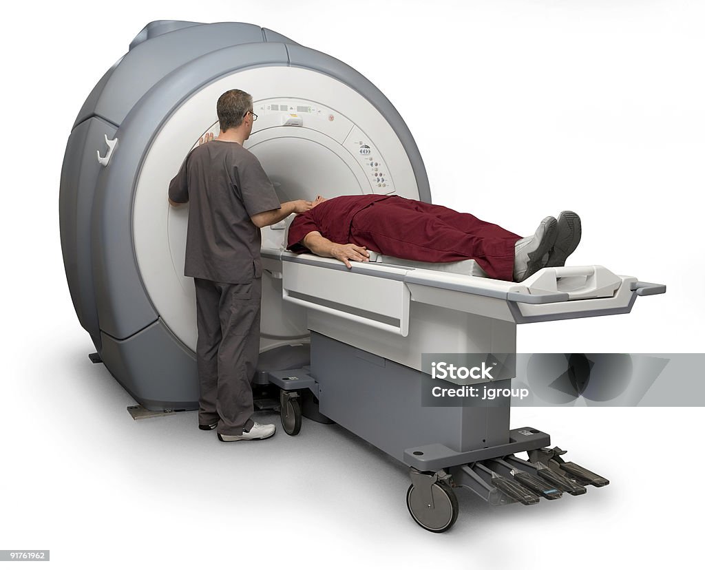 MRI 技術者と患者 - MRI検査のロイヤリティフリーストックフォト