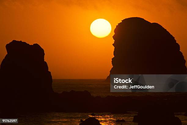 Sunset Over The Pacific Ocean With Rock Stacks Stock Photo - Download Image Now - Beach, Beauty In Nature, Clallam County
