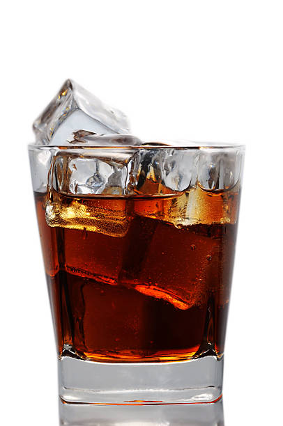 istock Glass with cola and ice cubes on white background 91763244