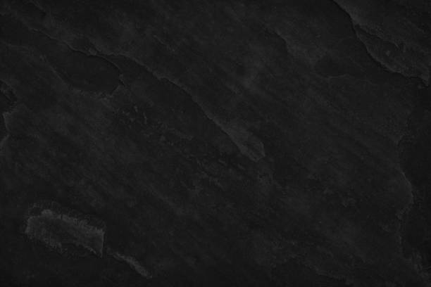 istock Dark black slate stone background blank for design 917633050