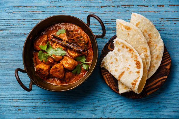 istock Chicken tikka masala spicy curry meat food 917633428