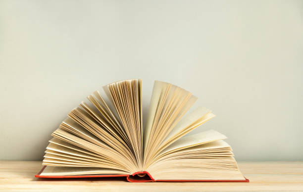 istock Open book on wooden table. Education background. Back to school. Free copy space. 917633628