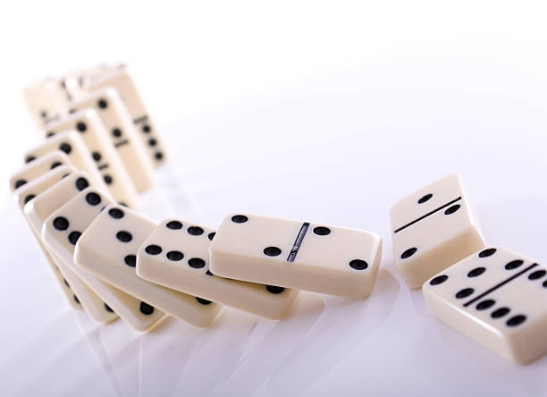 Falling dominos  domino effect stock pictures, royalty-free photos & images